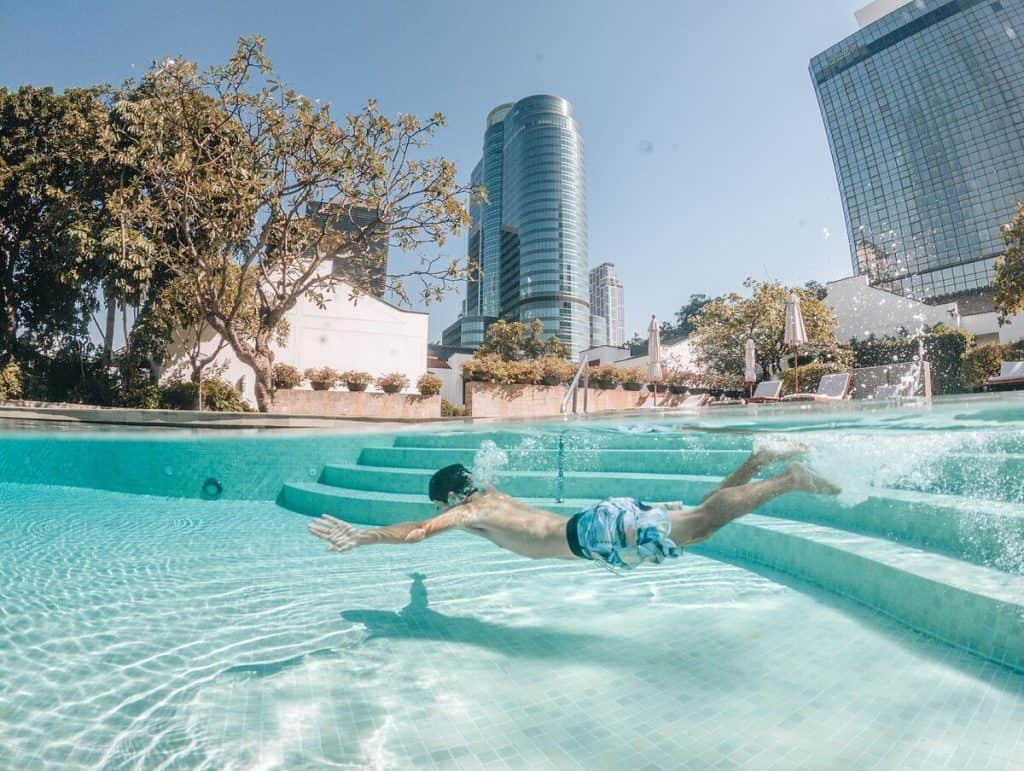 People enjoying pool at the hotel