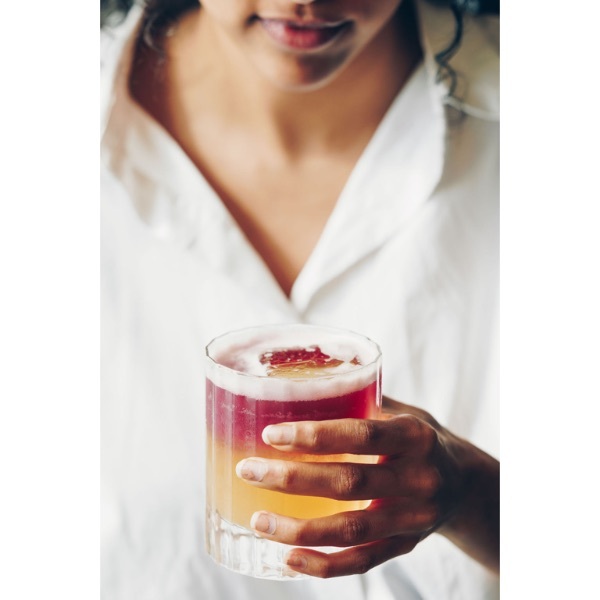 Woman holding a cocktail