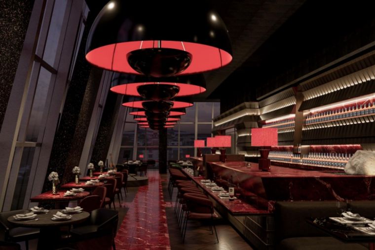 Modern restaurant interior with black and red decor, large dome-shaped pendant lights, red marble tables, and sleek shelving along the walls. Tables are set for dining and the atmosphere is elegant and moody.