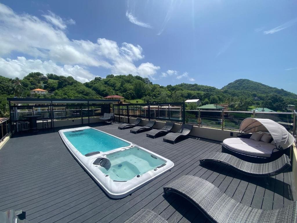 A hot tub on the roof of a house